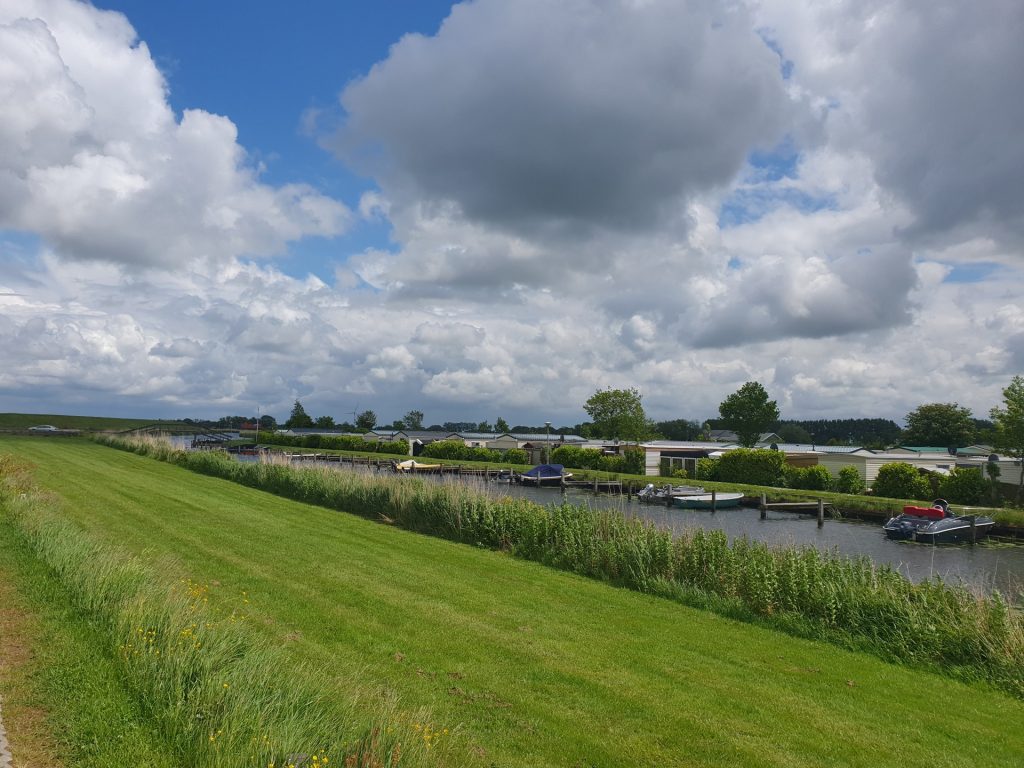 View on a ditch with a camping at the other side